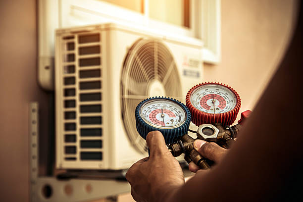Professional Heat Pump Repair technician working in Burnett, WI